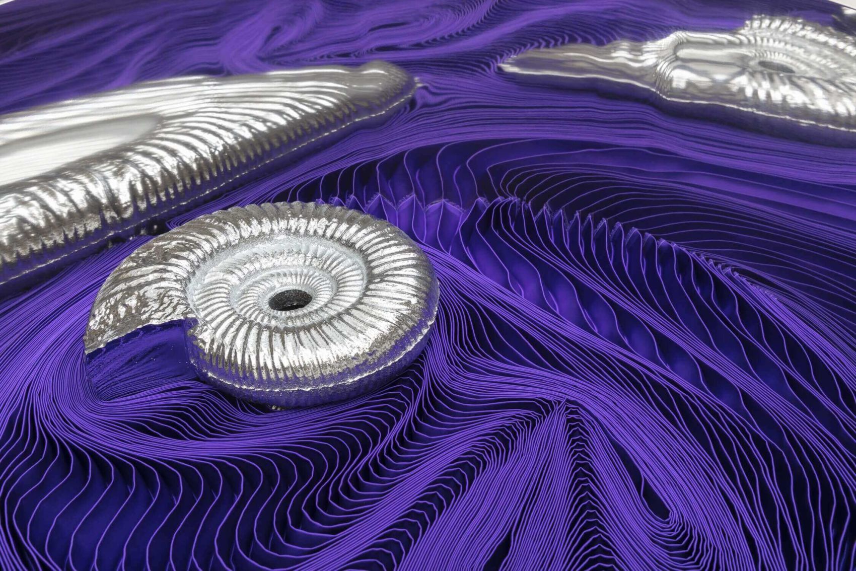 Dry Cask (Silk Cut) Dry Cask (Silk Cut), 2023
Mirror-polished, lazer-cut, curved and welded sheet stainless steel, accordion-pleated crepe satin silk, sand-cast, vapor-blasted and chromed aluminium, sand-cast and vapor-blasted aluminium /
28 × 58 cm; 24 × 60 cm; 26 × 63 cm /
Photo: Lucy Dawkins