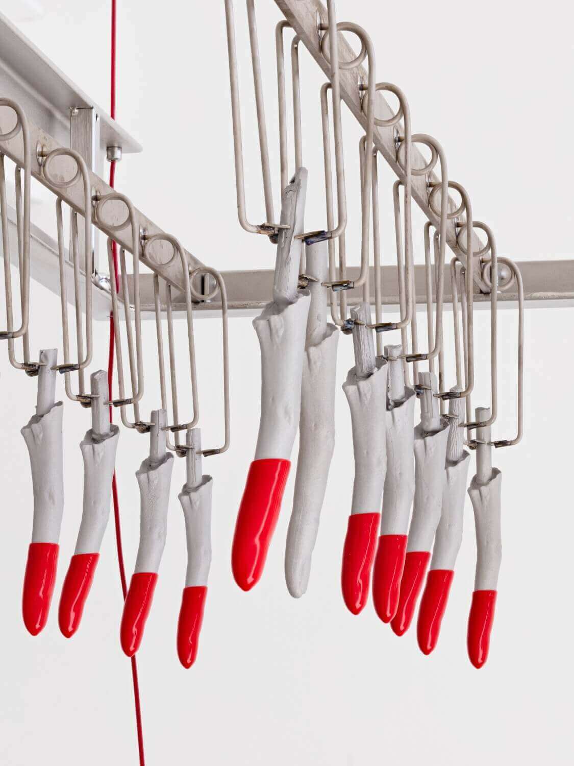 Mechanoreceptor, Icicles Mechanoreceptor, Icicles (red, red) (triple spring, triple strip), 2018 /
Lost-wax cast and PVC-dipped aluminium, titanium, electropolished stainless steel, stainless steel wire, sheet stainless steel, PVC coated stainless steel cables, fixings /
dimensions variable /
Photo: Lewis Ronald
